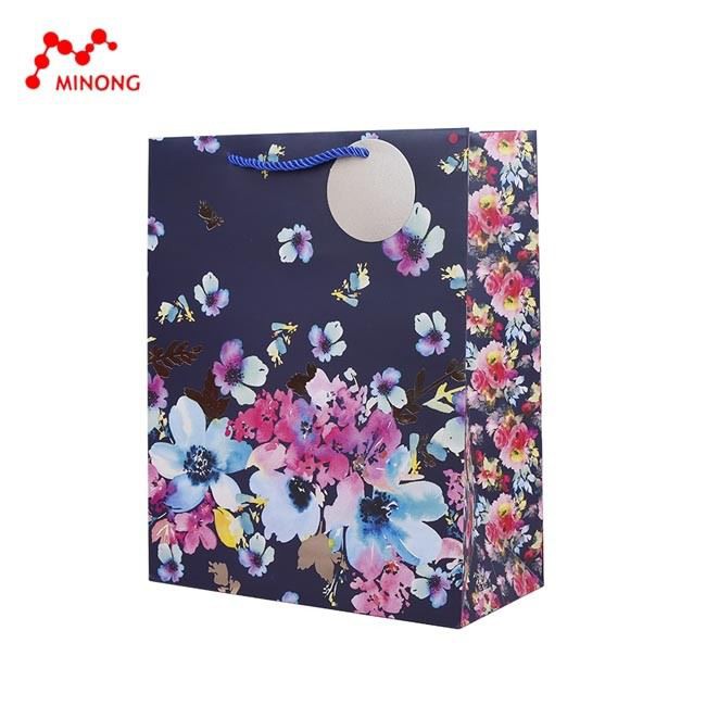 black paper bags with handles